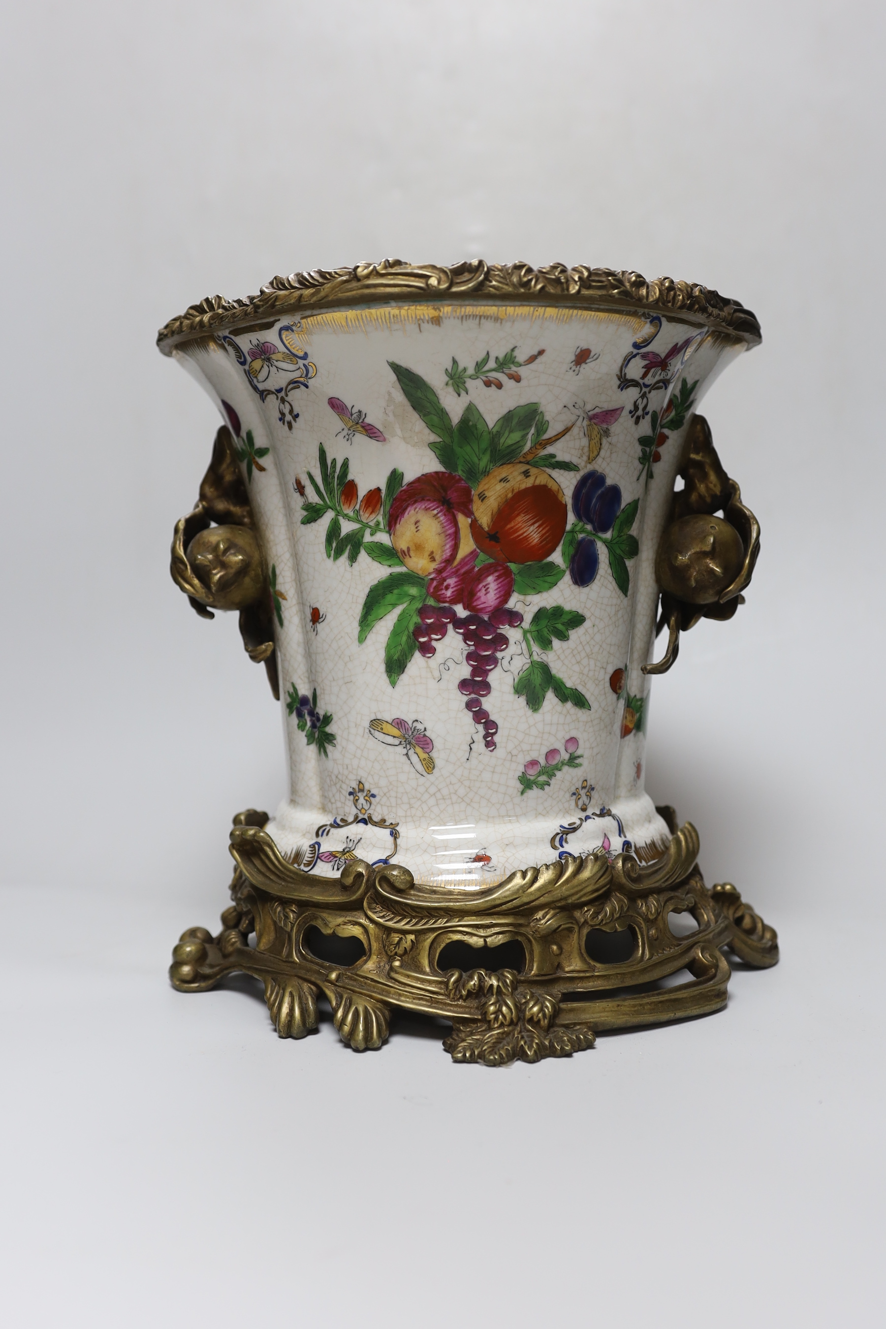 A brass mounted porcelain vase, 27cm